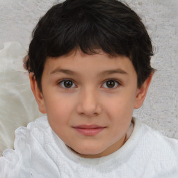 Joyful white child female with short  brown hair and brown eyes