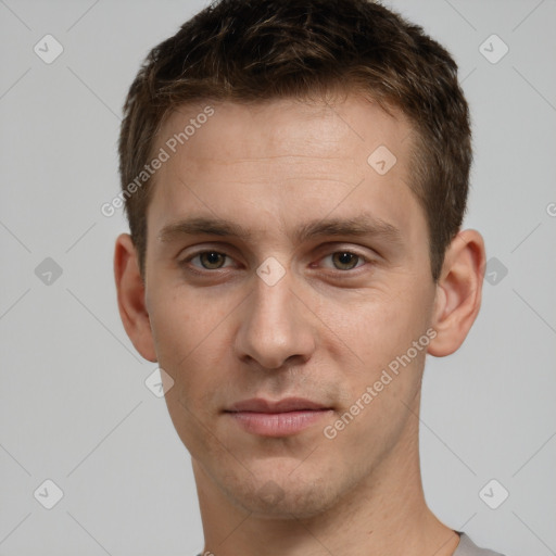 Neutral white young-adult male with short  brown hair and brown eyes