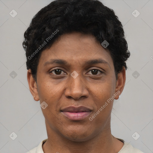 Joyful black young-adult female with short  black hair and brown eyes
