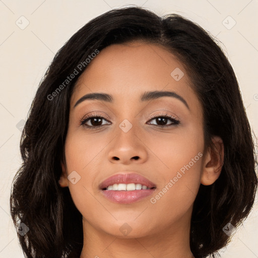 Joyful asian young-adult female with long  brown hair and brown eyes