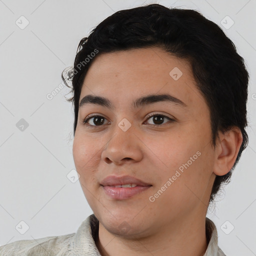 Joyful white young-adult male with short  black hair and brown eyes