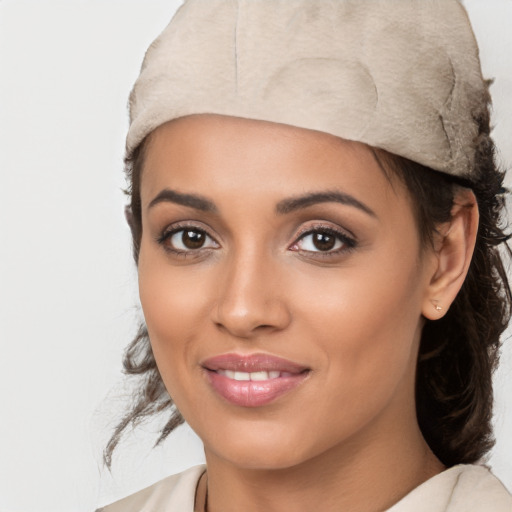 Joyful white young-adult female with medium  black hair and brown eyes