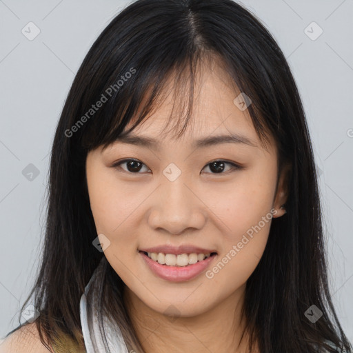 Joyful asian young-adult female with long  brown hair and brown eyes