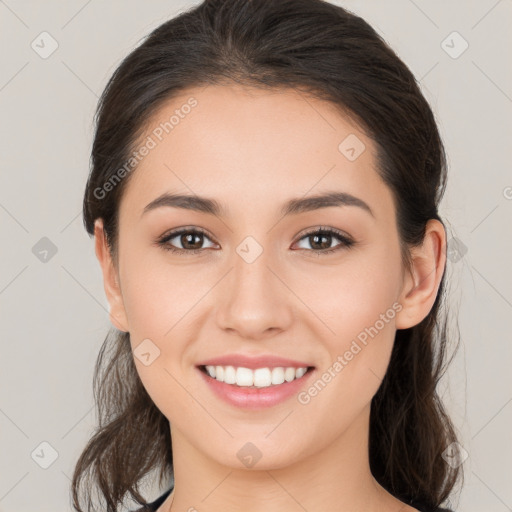 Joyful white young-adult female with long  brown hair and brown eyes