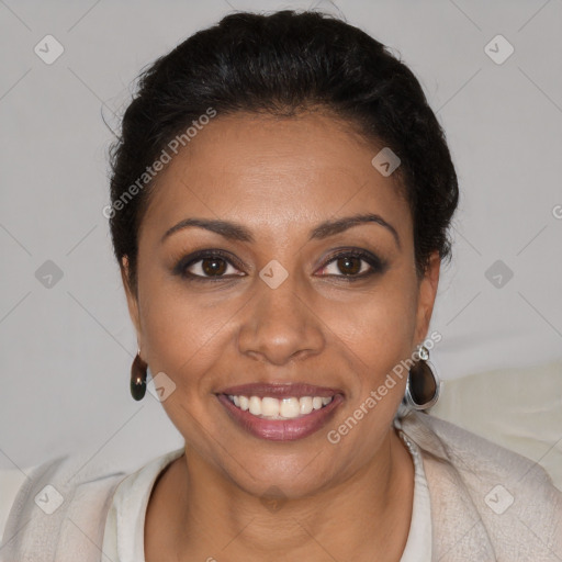 Joyful latino young-adult female with short  brown hair and brown eyes