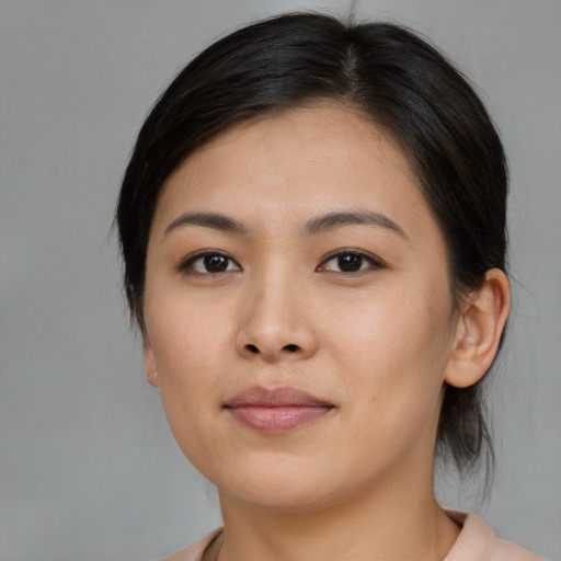 Neutral asian young-adult female with medium  brown hair and brown eyes