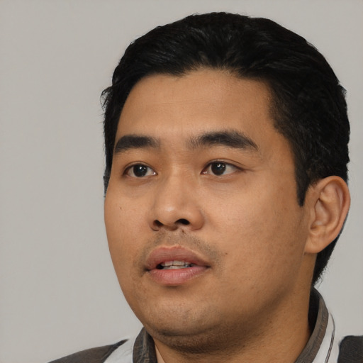 Neutral asian young-adult male with short  black hair and brown eyes