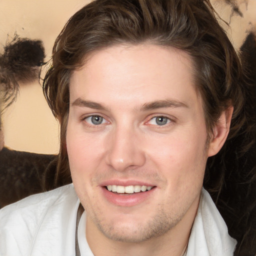 Joyful white young-adult male with medium  brown hair and brown eyes