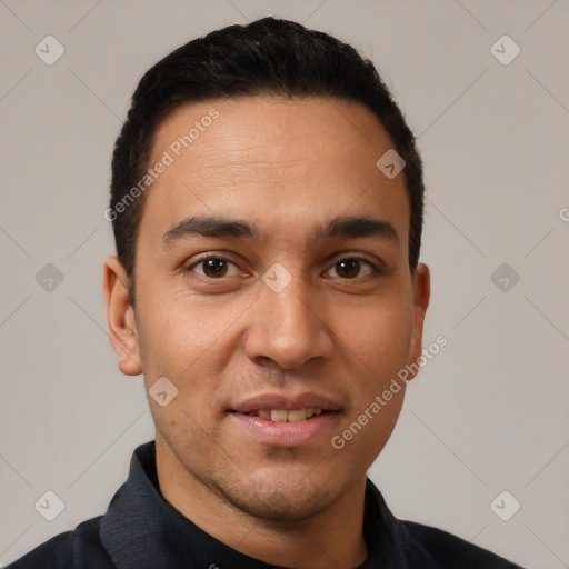 Joyful white young-adult male with short  black hair and brown eyes