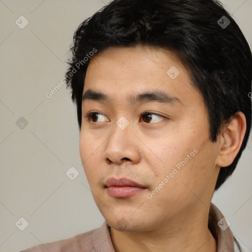 Neutral asian young-adult male with short  black hair and brown eyes