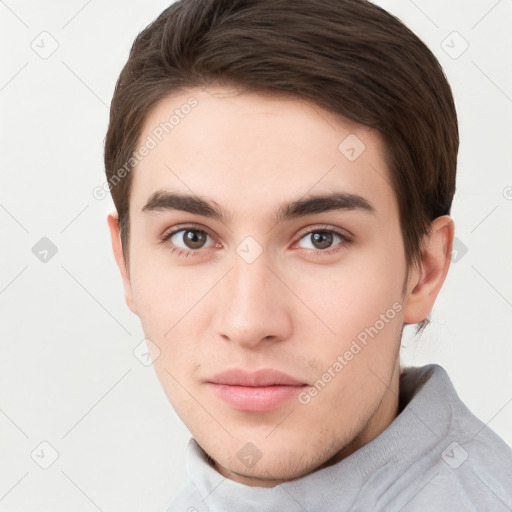 Neutral white young-adult male with short  brown hair and brown eyes