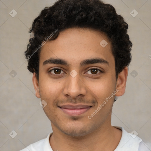 Joyful latino young-adult male with short  brown hair and brown eyes