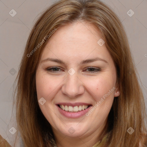 Joyful white adult female with long  brown hair and brown eyes