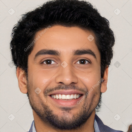 Joyful latino young-adult male with short  black hair and brown eyes