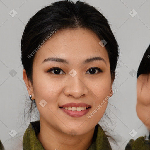 Joyful asian young-adult female with medium  brown hair and brown eyes