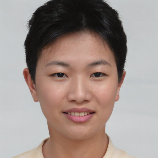 Joyful asian young-adult female with short  brown hair and brown eyes