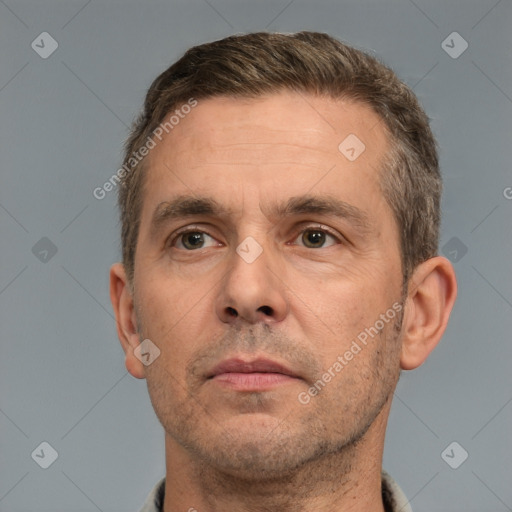 Neutral white adult male with short  brown hair and brown eyes