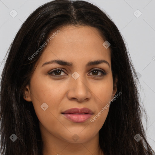 Joyful latino young-adult female with long  brown hair and brown eyes