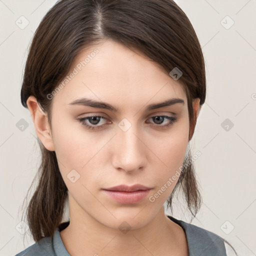 Neutral white young-adult female with medium  brown hair and brown eyes