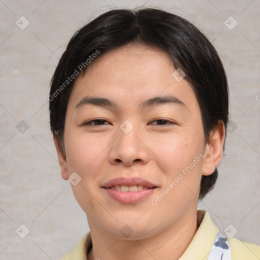 Joyful asian young-adult female with short  brown hair and brown eyes