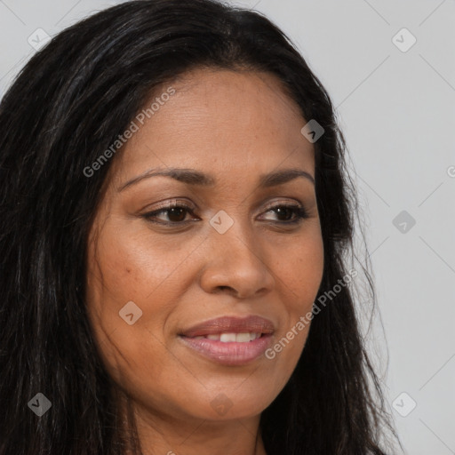 Joyful latino young-adult female with long  brown hair and brown eyes