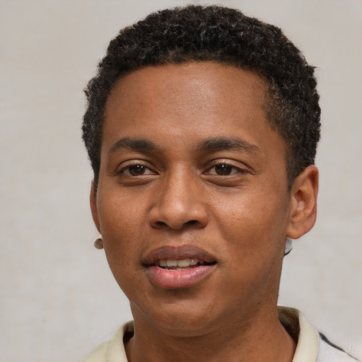 Joyful black young-adult male with short  black hair and brown eyes