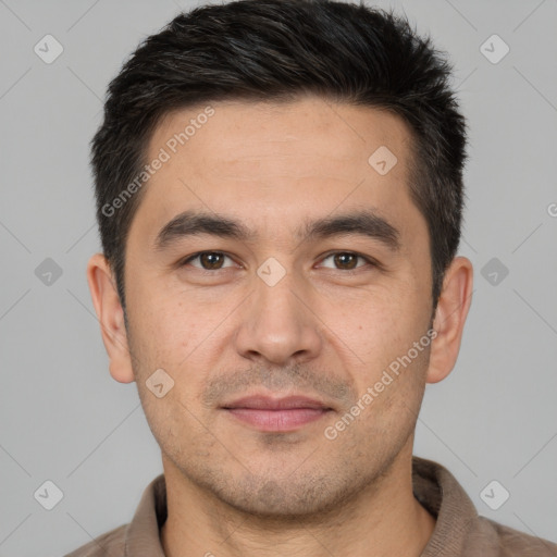 Joyful white adult male with short  brown hair and brown eyes