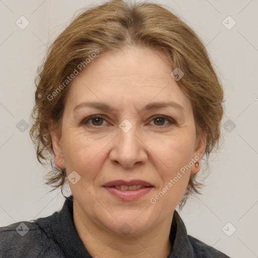 Joyful white adult female with medium  brown hair and brown eyes