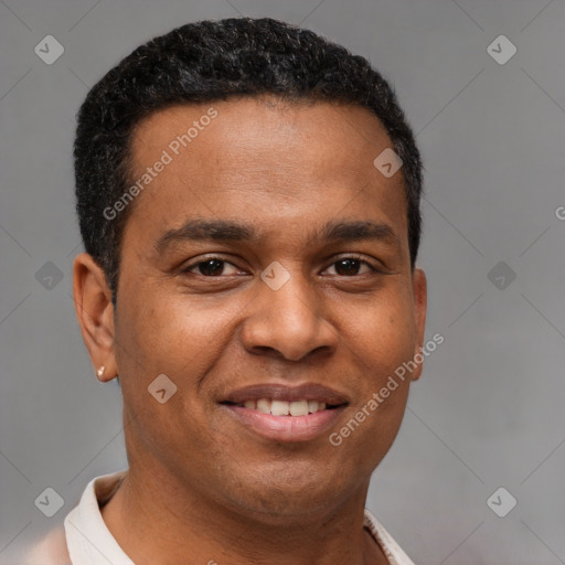 Joyful latino young-adult male with short  brown hair and brown eyes