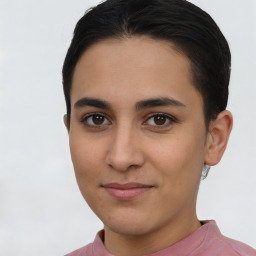 Joyful latino young-adult female with short  brown hair and brown eyes