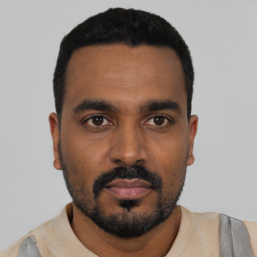 Neutral black young-adult male with short  black hair and brown eyes