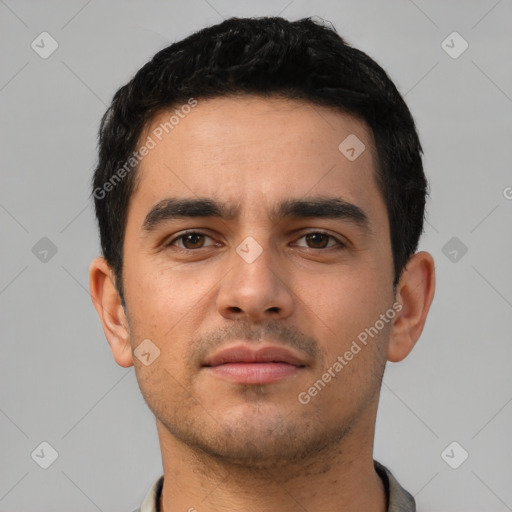 Neutral latino young-adult male with short  black hair and brown eyes