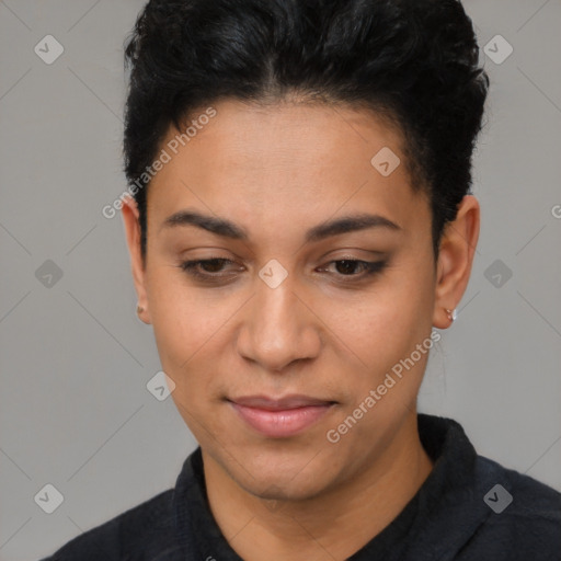 Joyful latino young-adult female with short  black hair and brown eyes