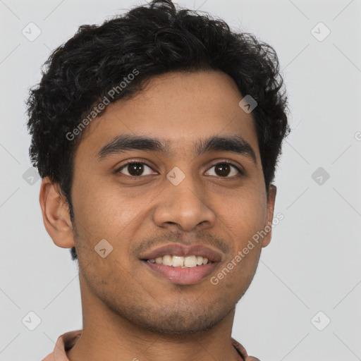 Joyful latino young-adult male with short  brown hair and brown eyes