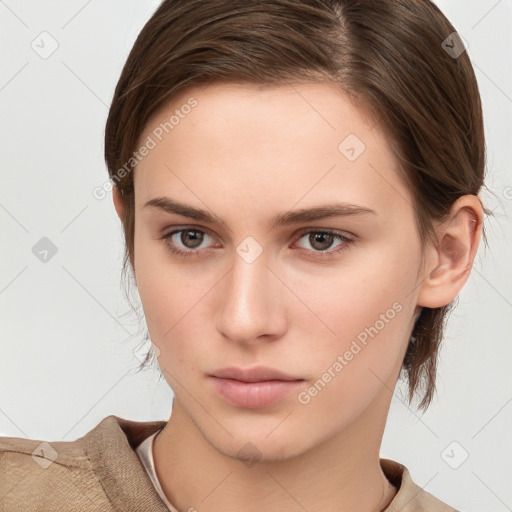 Neutral white young-adult female with short  brown hair and brown eyes