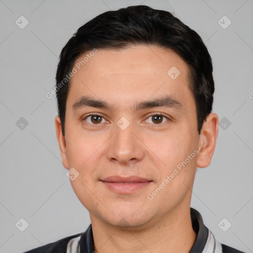 Joyful white young-adult male with short  black hair and brown eyes