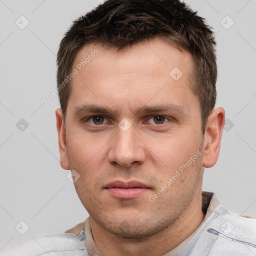 Neutral white young-adult male with short  brown hair and grey eyes