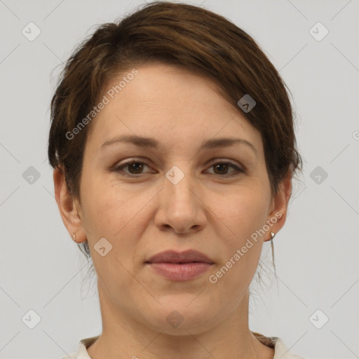 Joyful white adult female with short  brown hair and brown eyes