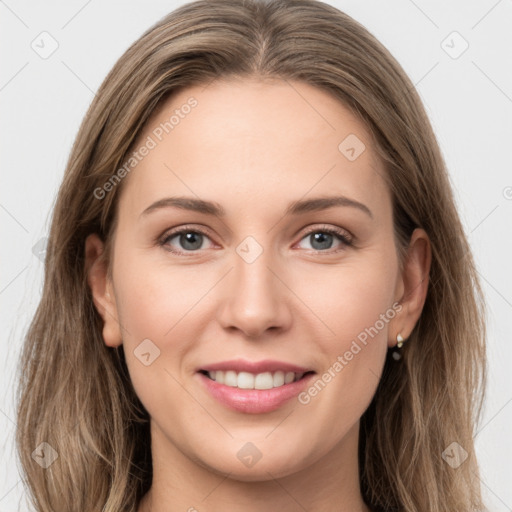 Joyful white young-adult female with long  brown hair and grey eyes