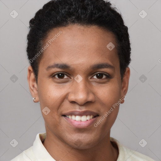 Joyful black young-adult male with short  black hair and brown eyes