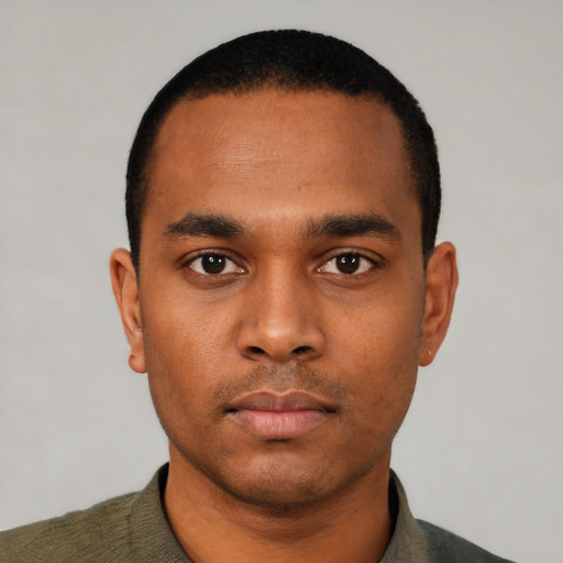Neutral black young-adult male with short  black hair and brown eyes