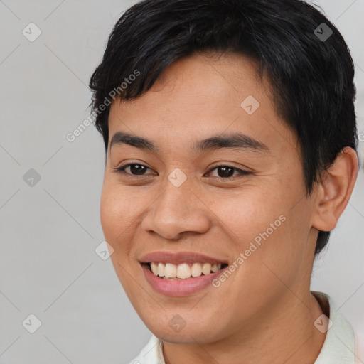 Joyful asian young-adult female with short  brown hair and brown eyes