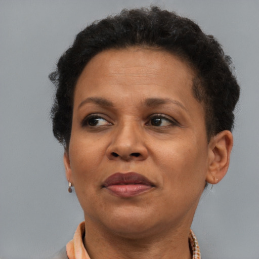 Neutral black adult female with short  brown hair and brown eyes