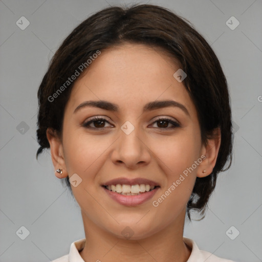 Joyful latino young-adult female with medium  brown hair and brown eyes