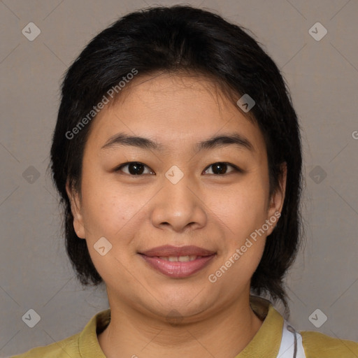 Joyful asian young-adult female with medium  brown hair and brown eyes