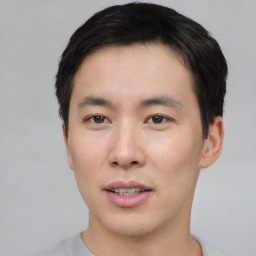 Neutral asian young-adult male with short  black hair and brown eyes