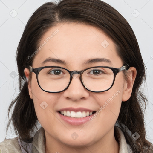 Joyful white young-adult female with medium  brown hair and brown eyes