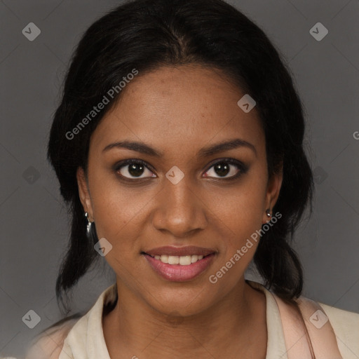 Joyful black young-adult female with medium  brown hair and brown eyes