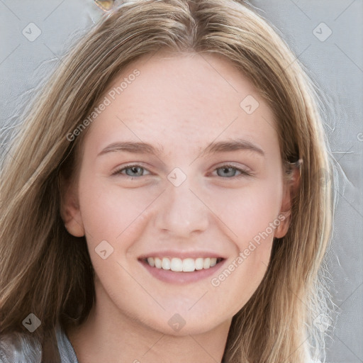 Joyful white young-adult female with long  brown hair and blue eyes