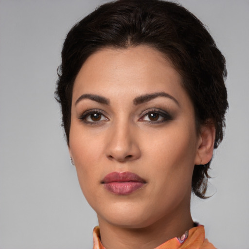 Neutral white young-adult female with short  brown hair and brown eyes